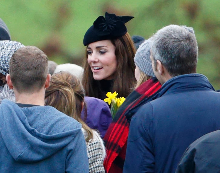 The duchess topped off her Michael Kors Collection tweed set with her flower-adorned "Fairy Tale" felt hat.