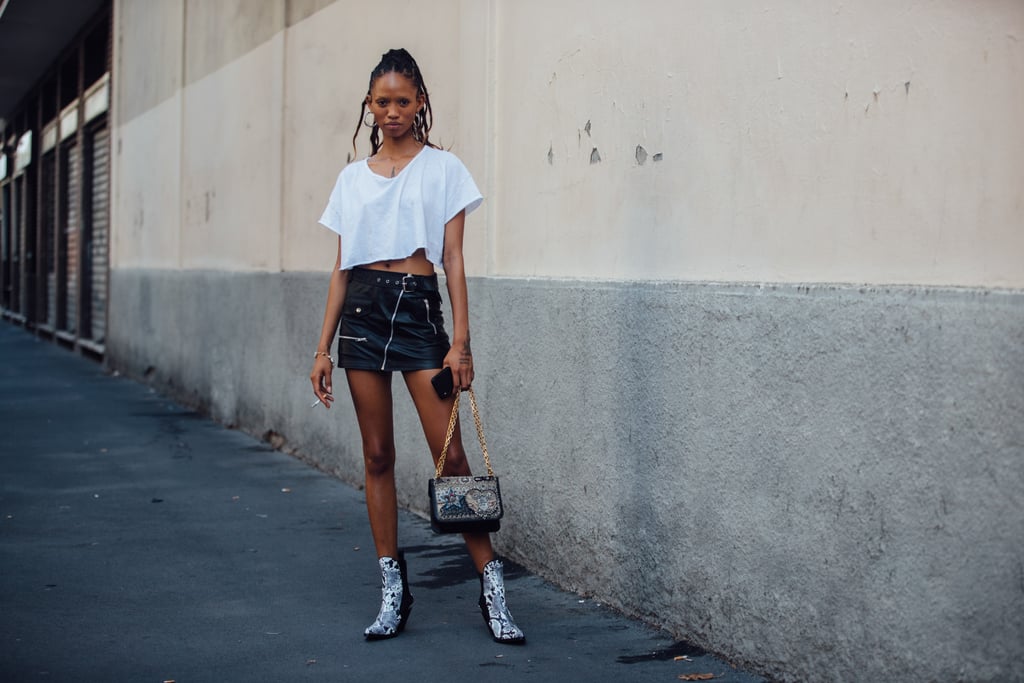On weekends, a cropped t-shirt feels fresh with a miniskirt an boots.