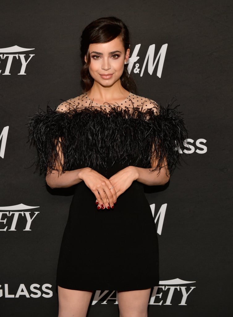 Wearing a Monique Lhuillier feather sheath dress at Variety's annual Power of Young Hollywood party in August 2018.