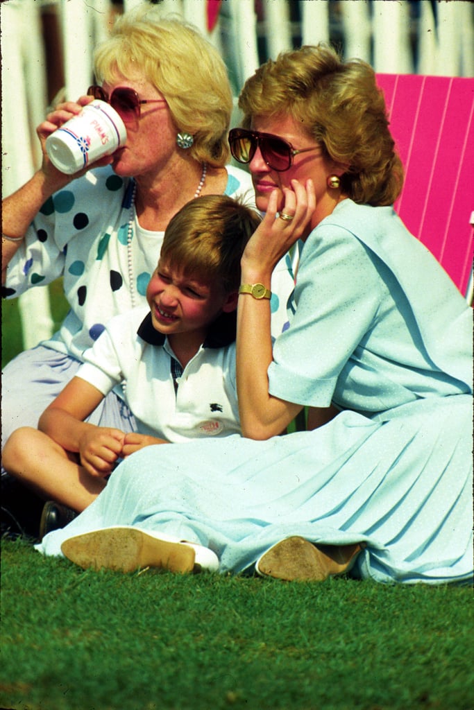 Prince William cuddled into his mom's lap while watching a polo tournament in Windsor in 1989.