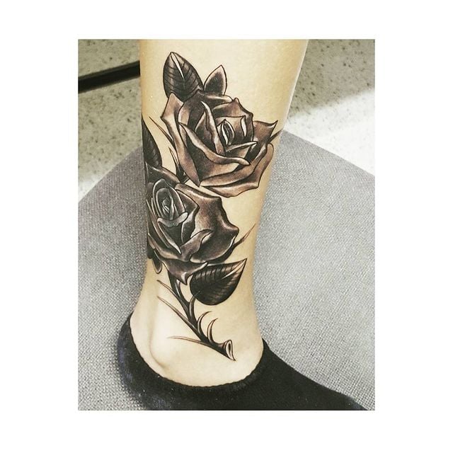 Karol G’s Rose Leg Tattoo