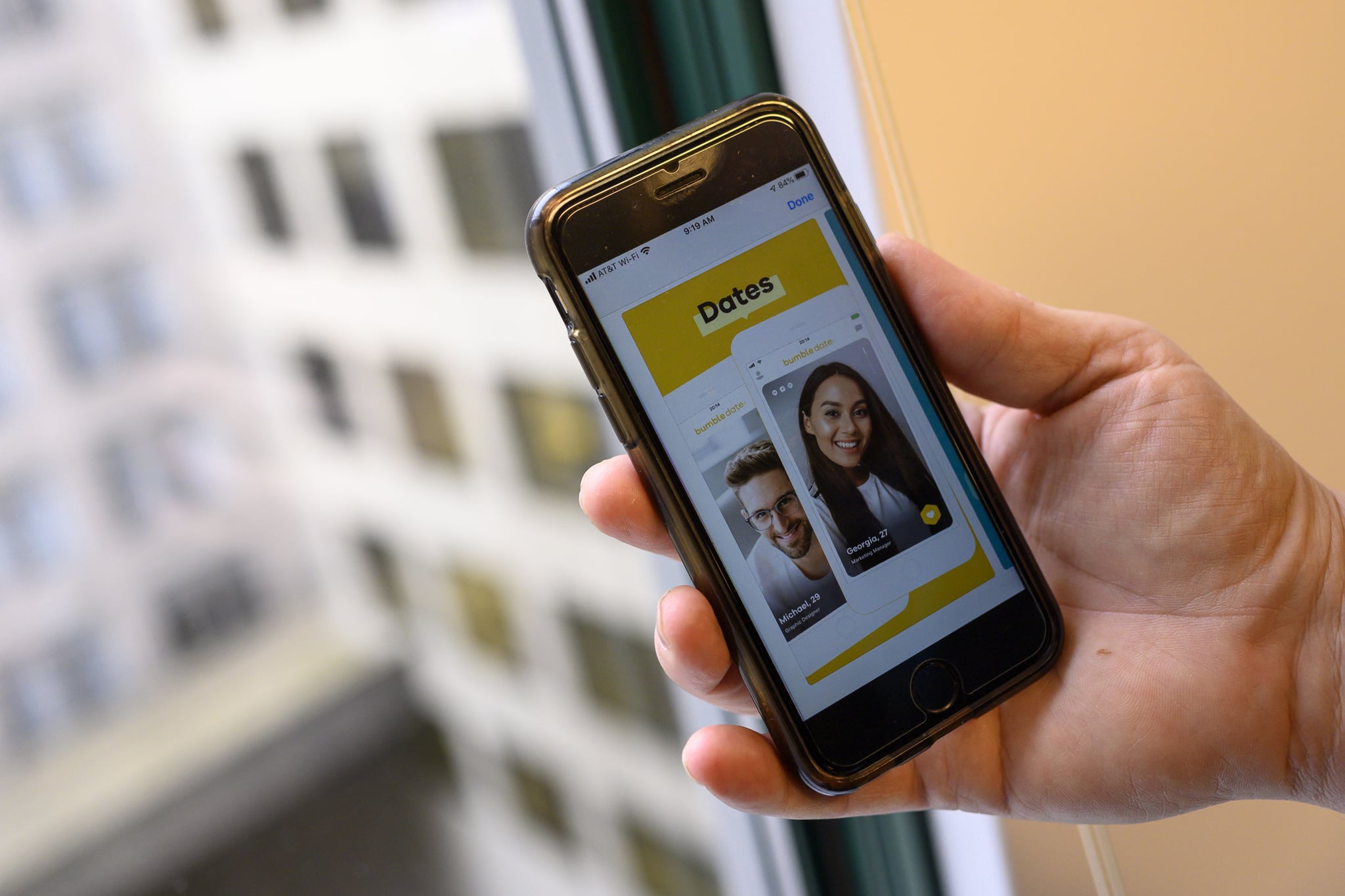 An AFP journalist holds his phone showing the dating application Bumble on February 26, 2020 in Washington,DC. - Days ahead of the Iowa Caucuses vote, Rhiannon Payne was on the Bumble dating app -- not to find a partner but to press her case for her candidate, Elizabeth Warren. Payne, a 28-year-old digital communications consultant, flew from San Francisco with a friend to volunteer for the Warren campaign and the two women came up with the idea while sitting in a hotel room. 