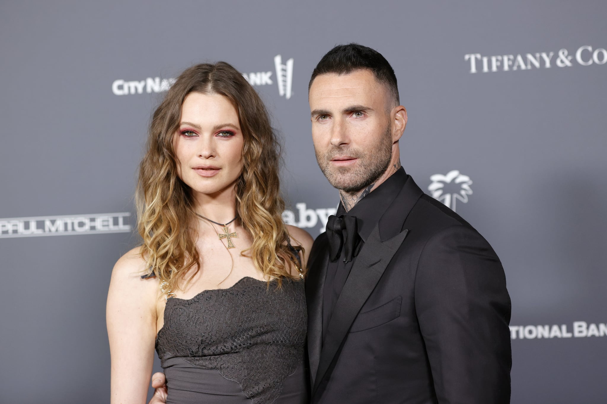 WEST HOLLYWOOD, CALIFORNIA - NOVEMBER 13: (L-R) Behati Prinsloo and Adam Levine attend the Baby2Baby 10-Year Gala presented by Paul Mitchell on November 13, 2021 in West Hollywood, California. (Photo by Amy Sussman/Getty Images for Baby2Baby)