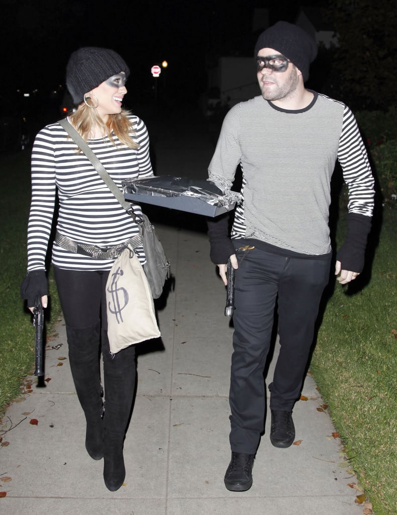 Hilary Duff and Mike Comrie matched as burglars while out in LA in 2011.