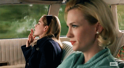 Sally comes home from her boarding school visit a new woman, and Betty even lets her smoke a cigarette in the car.