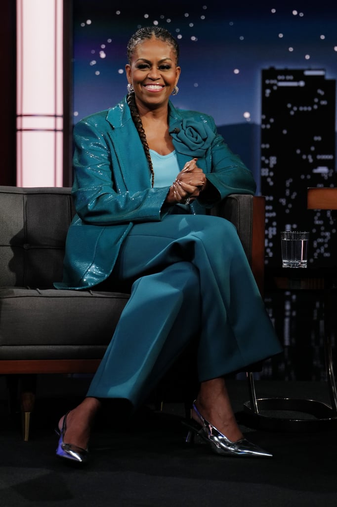 She wore a relaxed Maison Valentino suit in a bright turquoise hue, featuring a floral embellishment, for a visit to "Jimmy Kimmel Live."