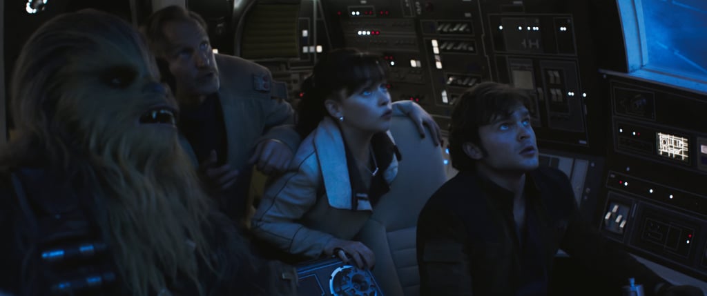 A tense moment in the Millennium Falcon with Chewbacca (Joonas Suotamo), Beckett (Woody Harrelson), Qi'ra (Emilia Clarke), and the man himself, Han Solo (Alden Ehrenreich).