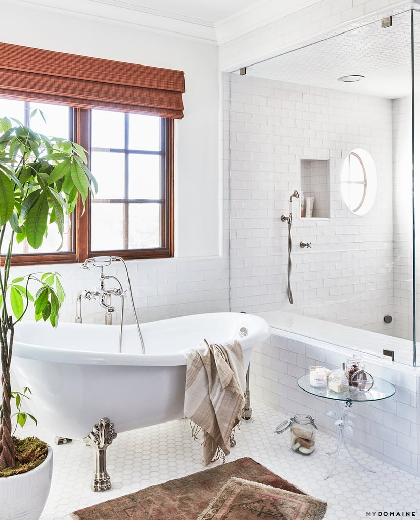 Practical renovations in the bathroom brought the home up to contemporary standards without compromising the home's architectural features. A cast iron claw-foot tub anchors the airy space.