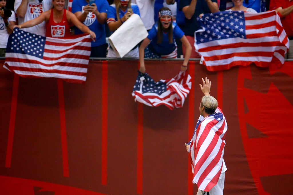 Abby Wambach Kisses Wife After Soccer Win