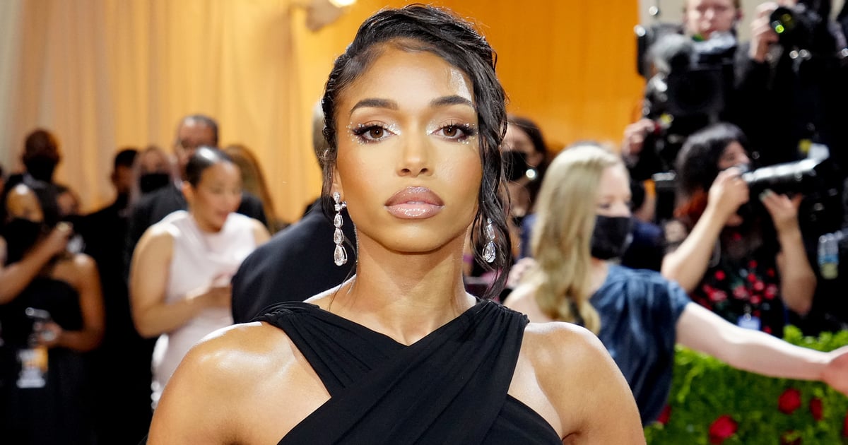 Lori Harvey’s Plunging Swimsuit in Turks and Caicos