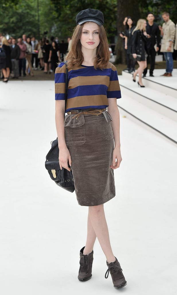 Tali Lennox arrived at Burberry in a peplum-trimmed pencil skirt and a striped tee.
Tali Lennox arrived at Burberry in a peplum-trimmed pencil skirt and a striped tee.