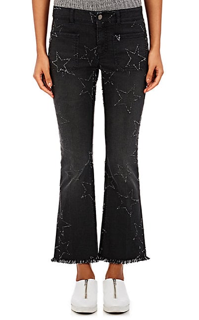 black jeans with frayed bottoms