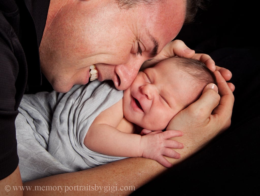 Baby Poops on Dad During Newborn Photo Shoot