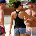 Nina Dobrev Chugs a Bottle of Vodka While Chilling on the Beach in Brazil