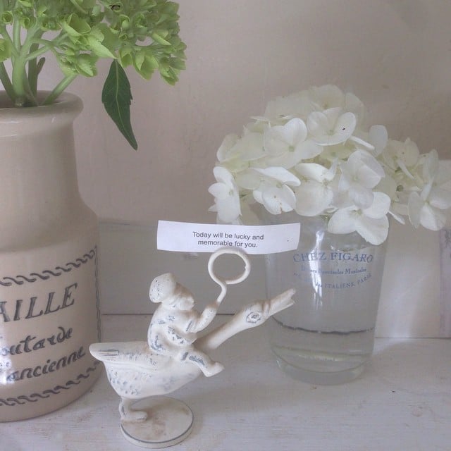 A few flowers go a long way in a tiny corner. 
Source: Instagram user mypetitemaison