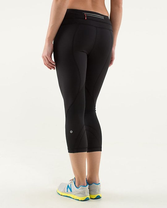 With a new CEO at its helm, I decided to give Lululemon another shot. When I finally tried on the Run Inspire Leggings, it was as if someone read my mind: everything I had ever wanted in a workout capri was there. The leggings have the perfect amount of sheen without falling into the territory of disco-ready spandex, and they feel soft against the skin. And even during the sweatiest workouts (SoulCycle, anyone?!), the material keeps me dry. It also keeps me covered — you'll be happy to know that Lululemon has revamped its material to avoid any see-through issues at the gym.
Best of all is the "block-it pocket," which promises to keep everything dry. Gone are days of going on a run and sheepishly handing my soggy money over to a store clerk while he looks at me in disgust. Postrecovery chocolate milk can now be bought without any guilt — and with completely bone-dry dollar bills!
