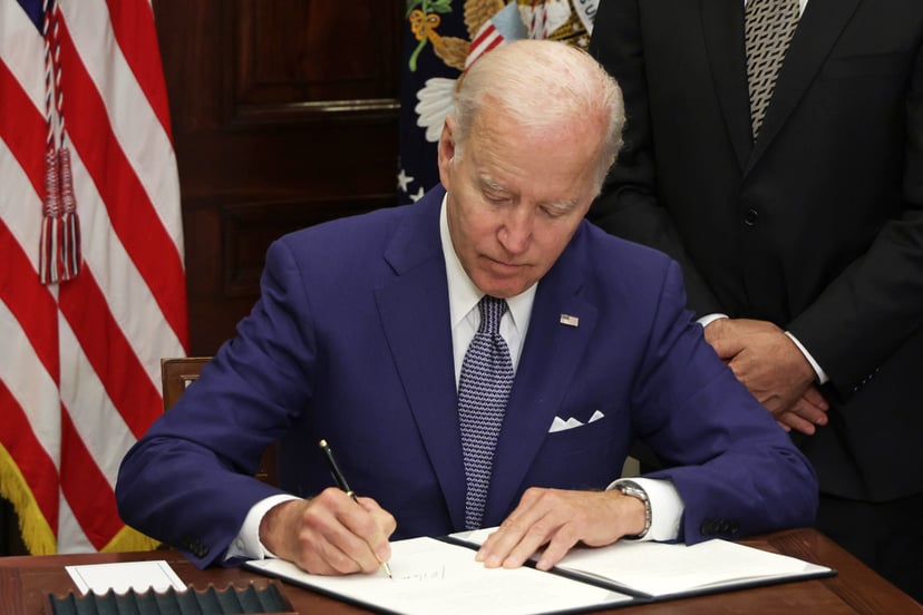 WASHINGTON, DC - JULY 08: U.S. President Joe Biden signs an executive order on access to reproductive health care services during an event at the Roosevelt Room of the White House on July 8, 2022 in Washington, DC. President Biden delivered remarks on rep