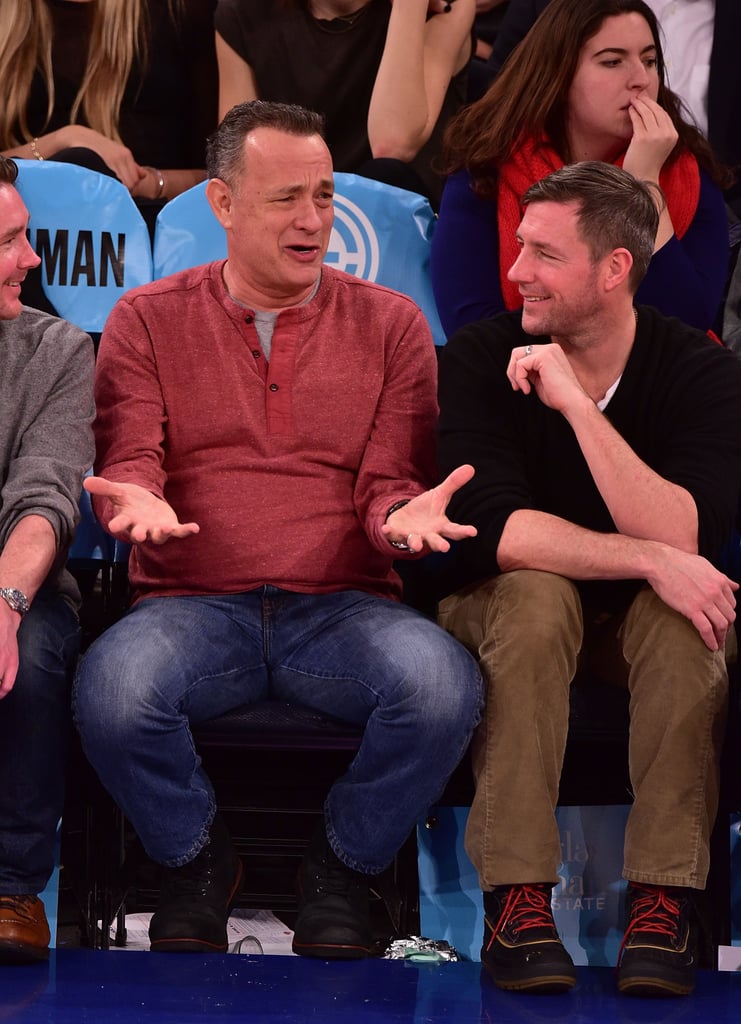 Tom Hanks and Ed Burns chatted during the Sacramento Kings vs. New York Knicks game in NYC on Tuesday.