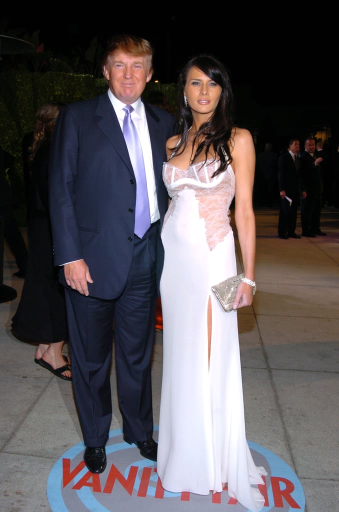 Melania wore a lacy, white bustier-style dress with a thigh-high slit to the 2004 Vanity Fair Oscars party.