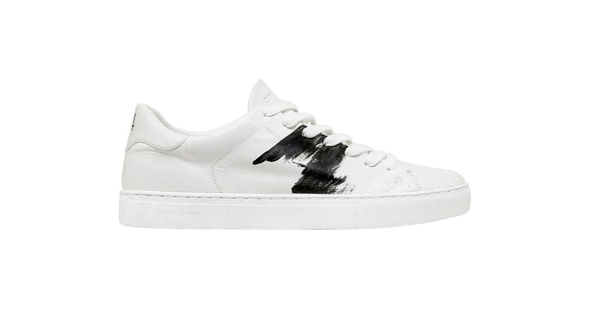 The brushed detail on these White Leather Sneakers ($179) adds a fun ...