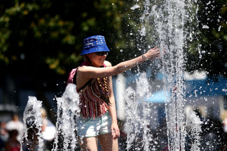 So people are walking through fountains to keep cool.