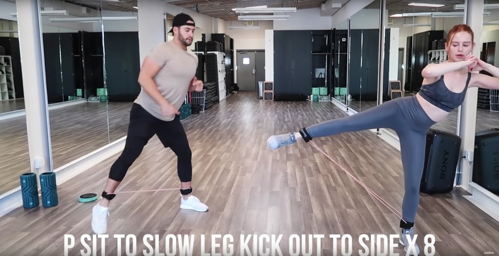 Next up, start in a squat position, and lift one leg and hip out to the side eight times. On your last rep, pulse that leg up and down eight more times. Repeat this for the other leg as well.