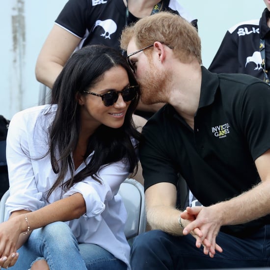 Prince Harry Whispering in Meghan Markle's Ear Pictures