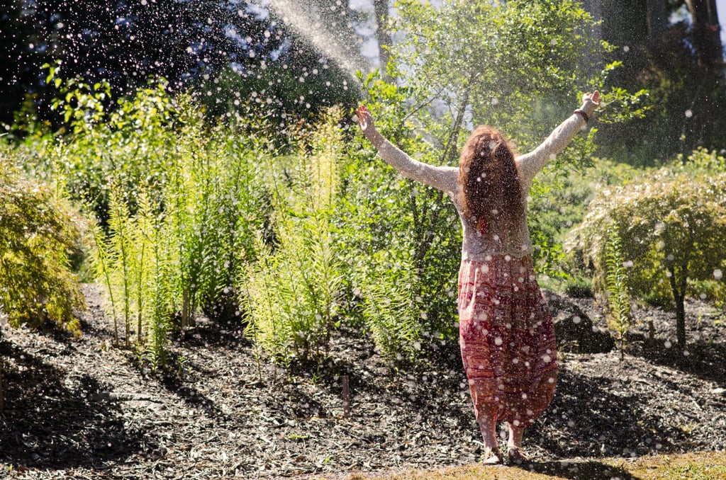 Play together in the sprinklers.