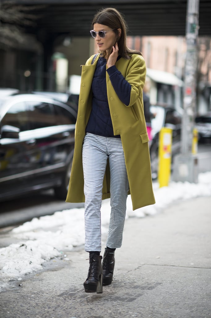 Hanneli Mustaparta kept it cool and classic in a pair of cropped, printed trousers and an understated but richly hued coat.
Source: Le 21ème | Adam Katz Sinding