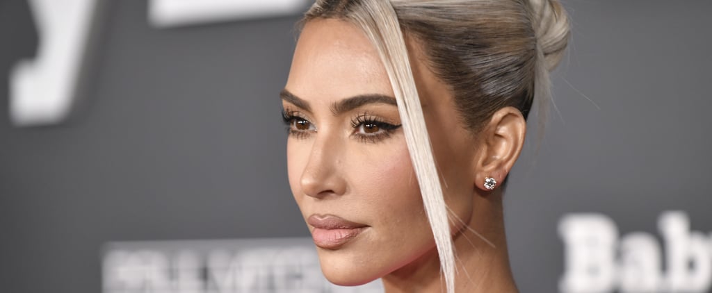 Kim Kardashian Wears a Silver Versace Gown For Christmas