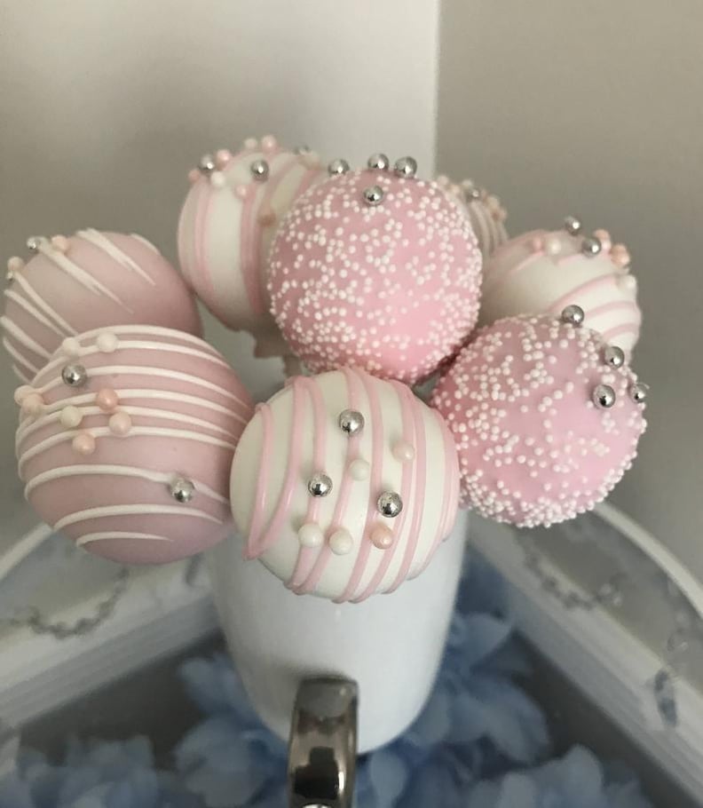 Light Baby Pink and White Drizzled Cake Pops With Sprinkles and Sugar Beads