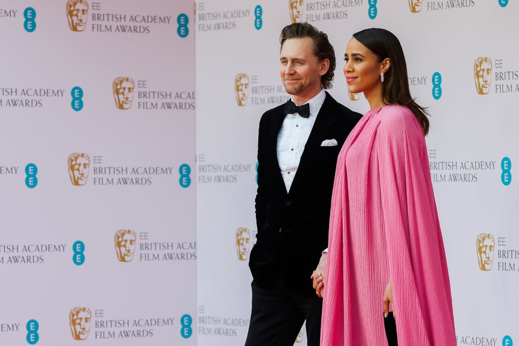 March 2022: Tom Hiddleston and Zawe Ashton Attend the BAFTAs Hand-in-Hand