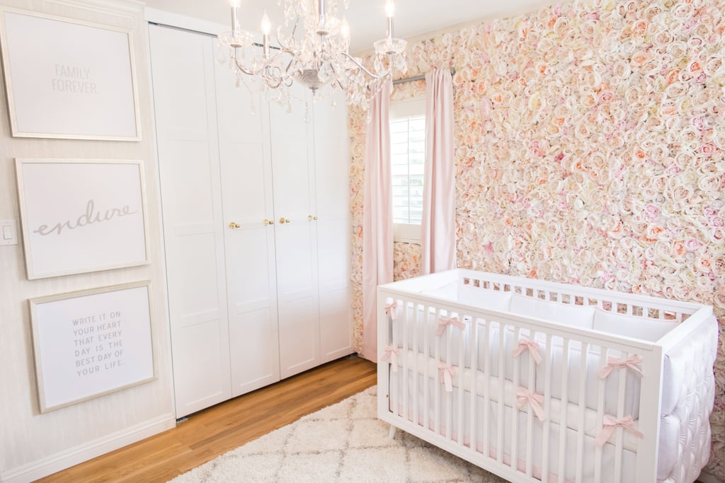 The closet's lacquered white wood doors aren't just pretty; they're also multifunctional. Lisa shares that she used, "bi-fold doors, as they have a horizontal pull that works with the door mullions but can also serve as a hook for hanging clothing."