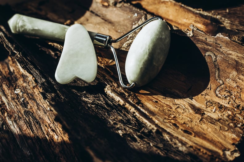 A jade roller and a gua sha tool have rich history in ancient Asian beauty rituals.