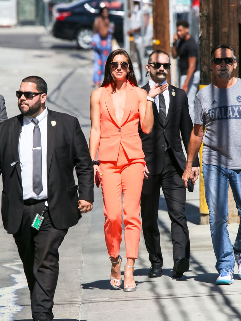 Alex Morgan's Orange Suit and Silver Heels July 2019