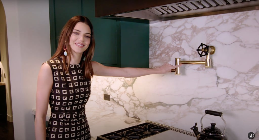 Yep, that's a golden pot-filler faucet to fuel her tea obsession.