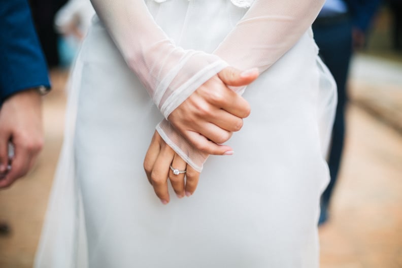 Brides hands with ring