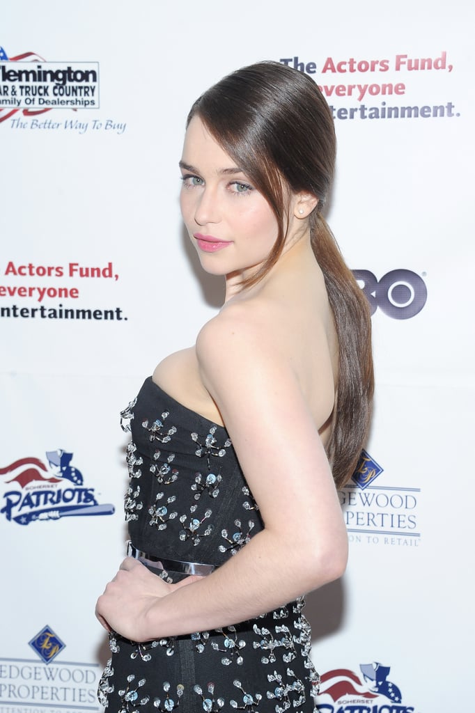 Using a shine hair serum is the best way to get the high-shine finish of Emilia Clarke's ponytail at the Actors Fund Gala. Using a shine hair serum is the best way to get the high-shine finish of Emilia Clarke's ponytail at the Actors Fund Gala.