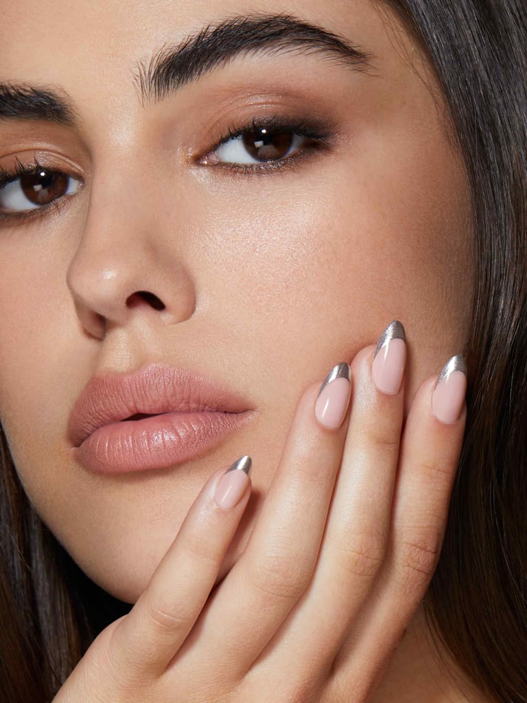 Static Nails Metallic French Short Almond Reusable Pop On Manicure ($20)
DIY-ing a French mani is the definition of "not worth the effort," but these press-on cuties make achieving the nail trend so easy.