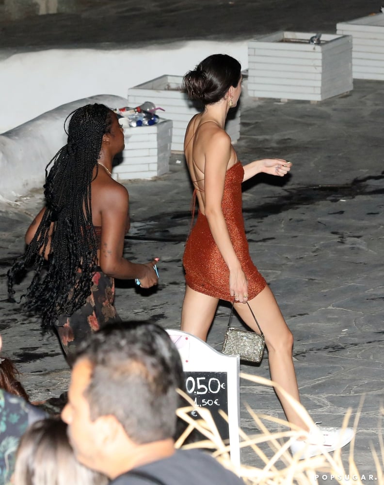 Kendall Jenner Orange Dress and Sneakers in Mykonos