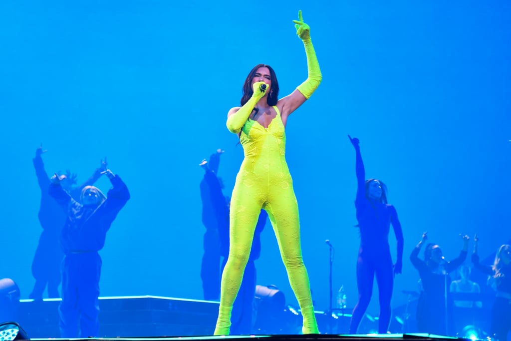 Dua Lipa Wears Neon Green Lace Balenciaga Catsuit For Tour