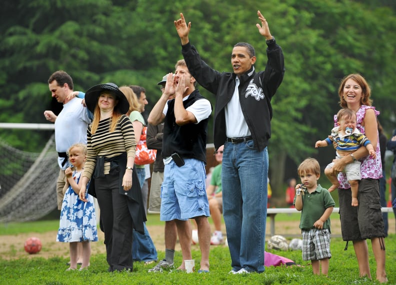 Watching his daughter Sasha's soccer game in 2009.