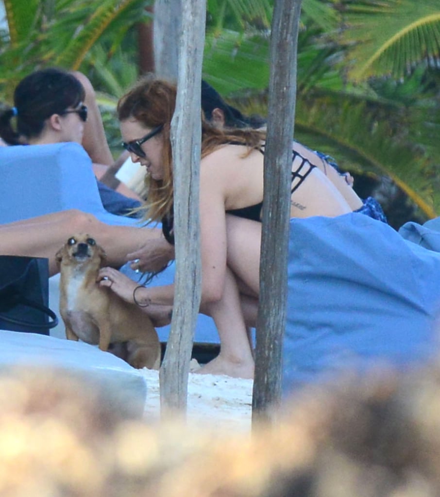 Rumer played with a pup on the beach.