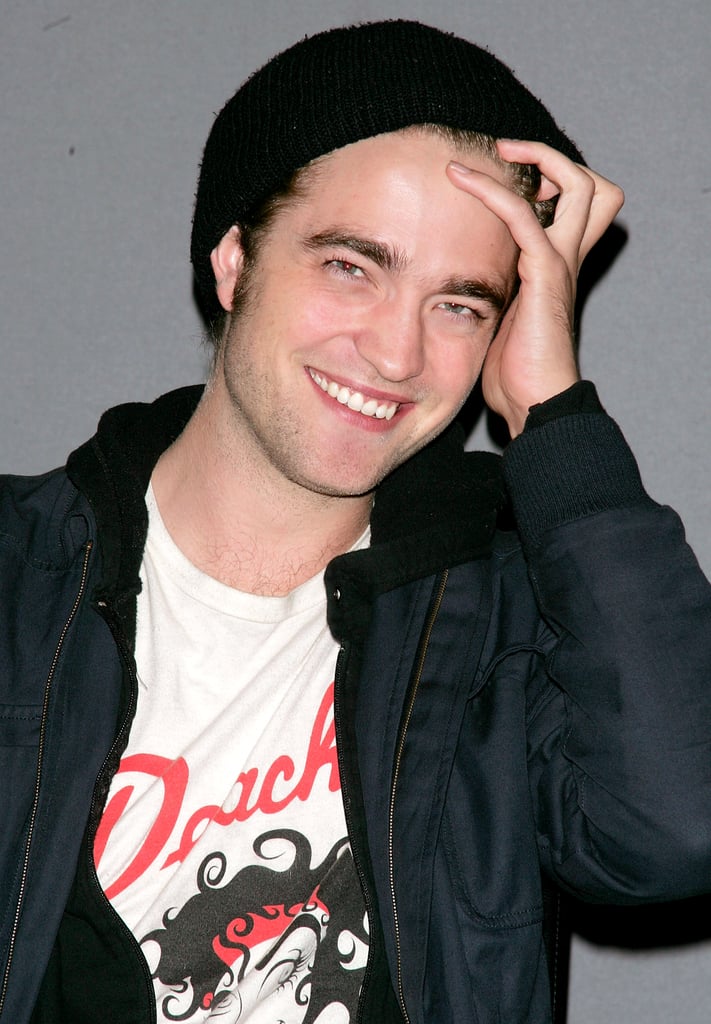 Rob didn't let a hat stop him from adjusting his locks during a visit to NYC's Apple store in November 2008.