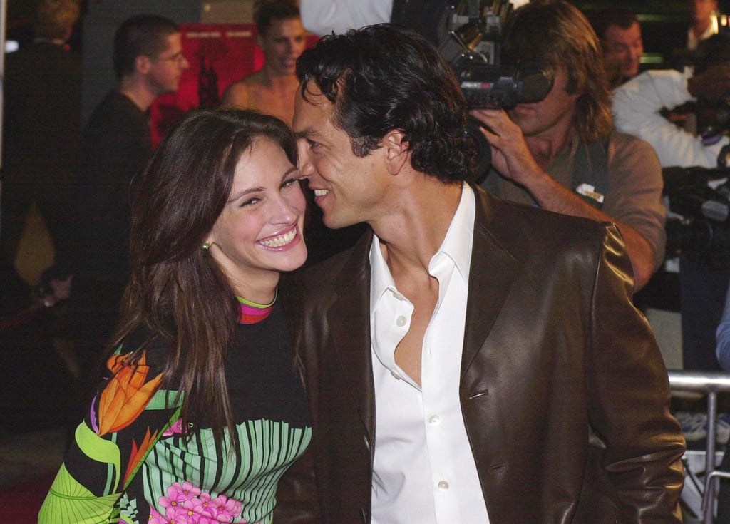 Julia shared a sweet red-carpet moment with Benjamin Bratt at the Red Planet premiere in 2000.
