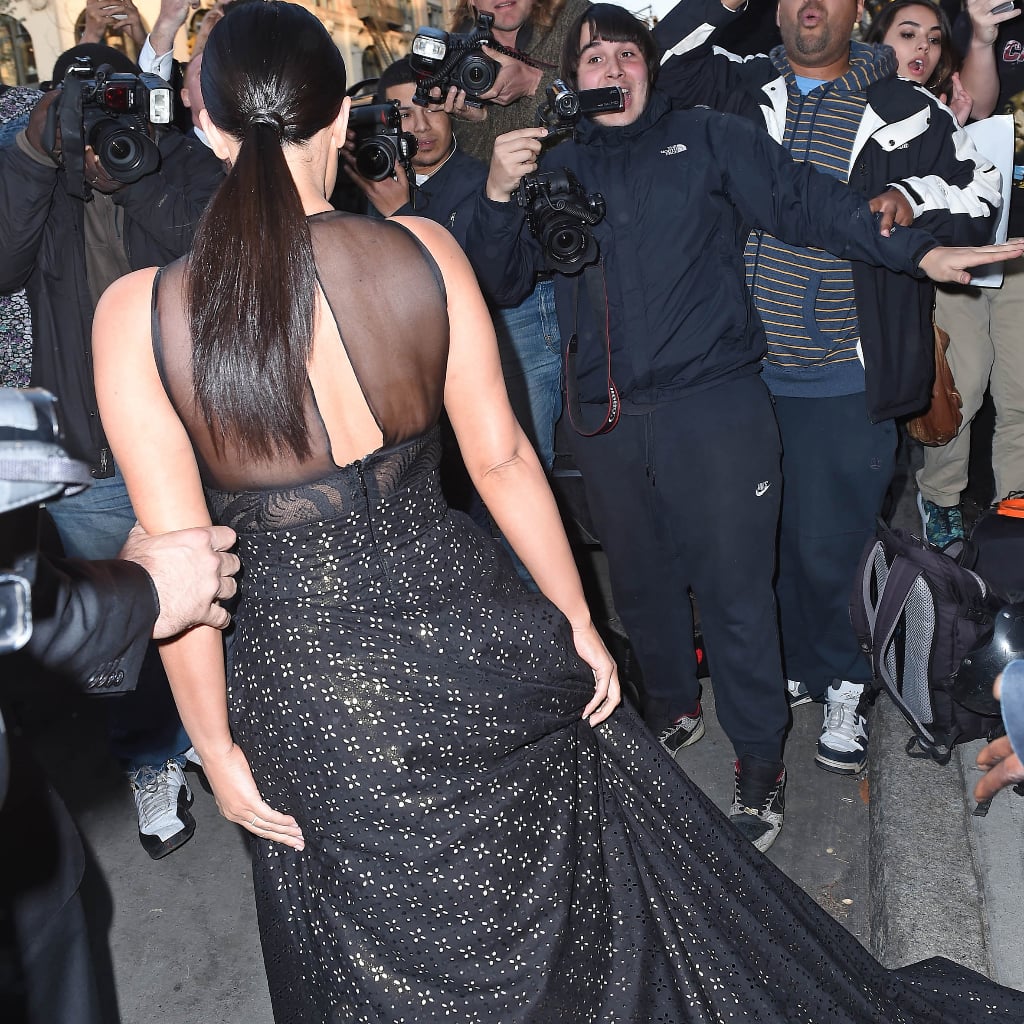 Man Stepping on Kim Kardashian's Dress