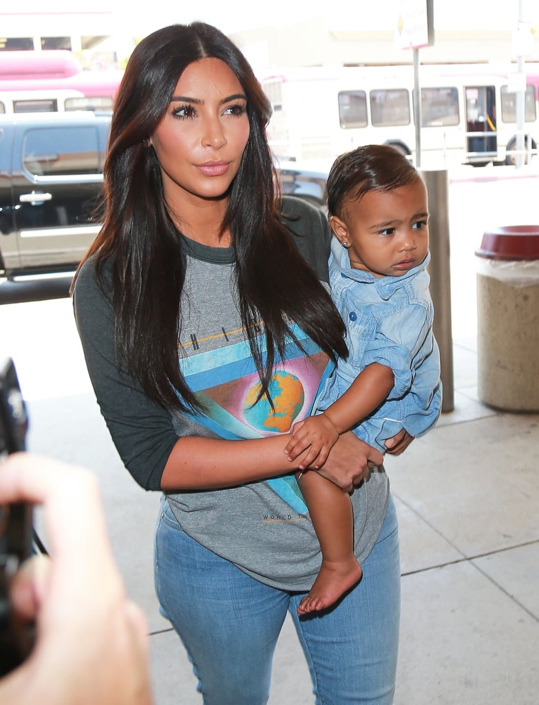 Kim Kardashian Carrying North West in LAX | Photos | POPSUGAR Celebrity