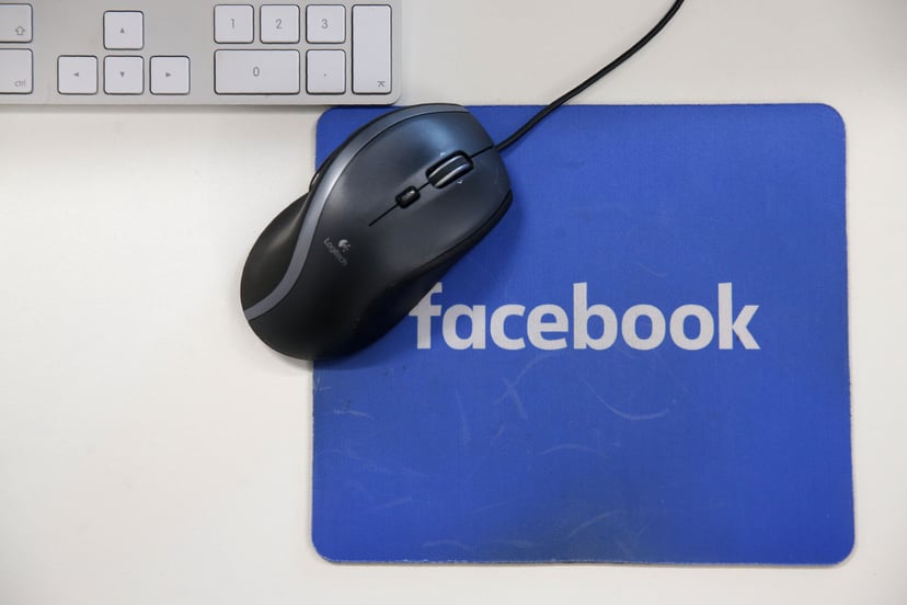 A mousepad with the Facebook logo is seen at Facebook's new headquarters, designed by Canadian-born American architect Frank Gehry, at Rathbone Place in central London on December 4, 2017.Social media titan Facebook opened a new office in London on Decemb