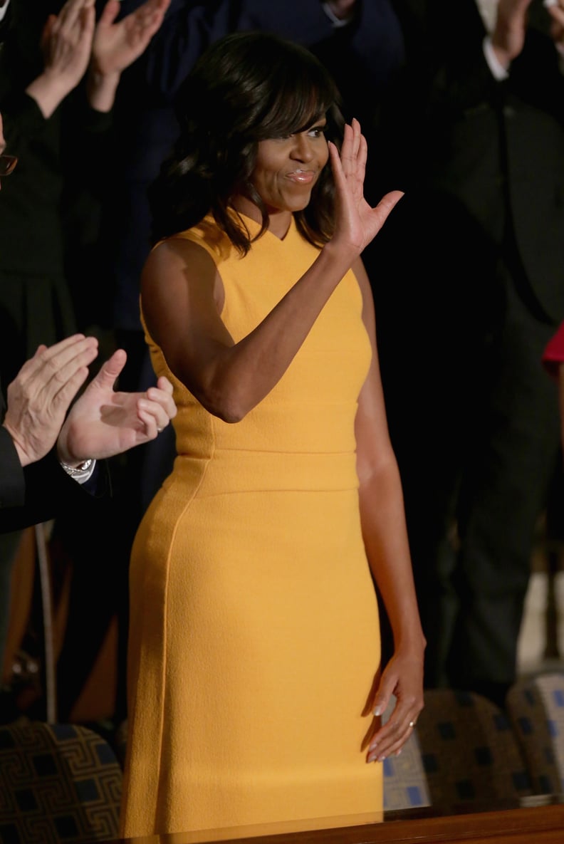 Michelle Obama Showed Off Her Toned Arms at the State of the Union in a Marigold Sleeveless Design