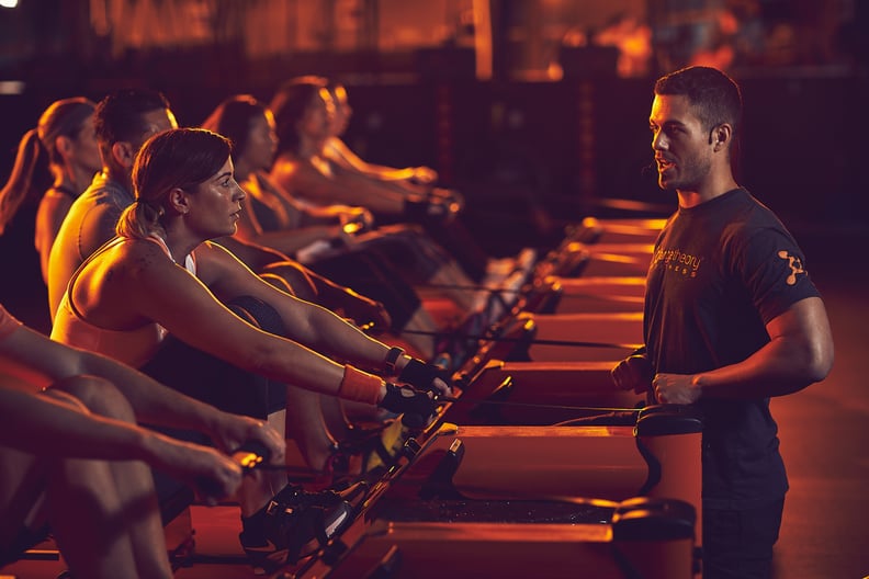 image of people working out on rowers during an orangetheory workout class to represent Orangetheory prices